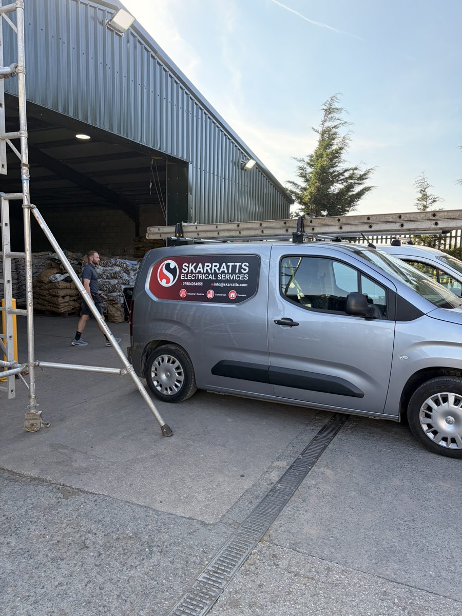 Skarratts Electrical Services branded van parked outside a customer's premises